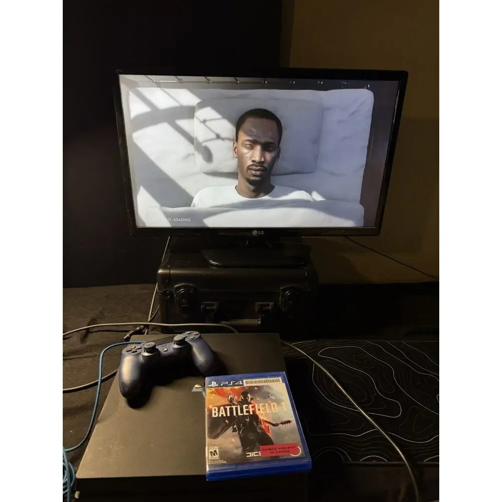 PlayStation 4 Pro Model CUH-7215B 1 TB controller And Game
